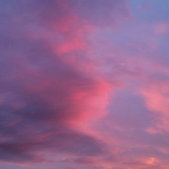 blue pink clouds background.