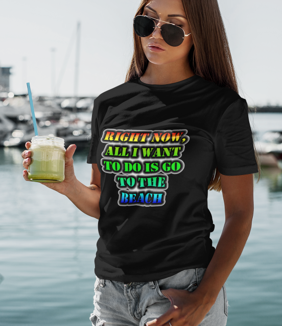 Girl wearing a black Right Now Go To The Beach t-shirt on a dock.