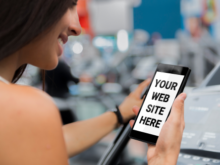 Woman on a treadmill looking at a phone screen that reads: Your Website Here.