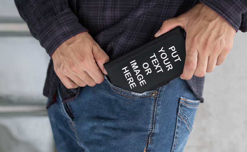 Man putting a black Your Text Or Image Here wallet in his pants pocket.